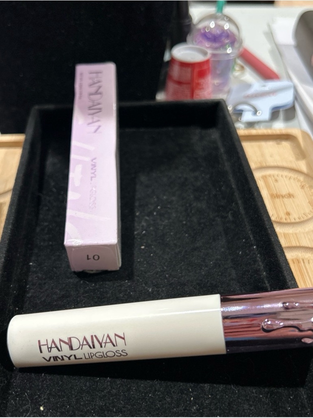 Vinyl lipgloss shade number 1